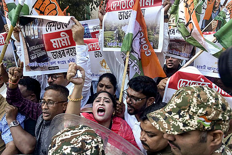 Congress workers raise slogans during a protest against Assam Chief Minister Himanta Biswa Sharma over allegations of corruption, in Guwahati.