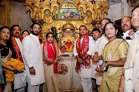 Maharashtra Deputy Chief Minister Sunetra Pawar with NCP MP Praful Patel during a visit to Siddhivinayak Temple, in Mumbai.