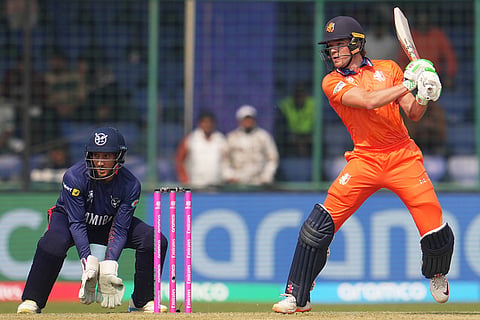 Netherlands' Bas de Leede plays a shot during the T20 World Cup cricket match between Namibia and Netherlands in New Delhi.