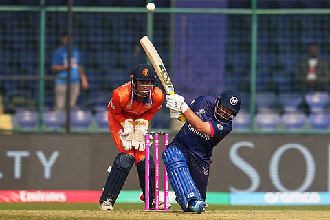 Namibia's Nicol Loftie-Eaton plays a shot during the T20 World Cup cricket match between Namibia and Netherlands in New Delhi.