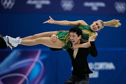 Holly Harris and Jason Chan of Australia compete during the rhythm dance in figure skating at the 2026 Winter Olympics, in Milan, Italy.