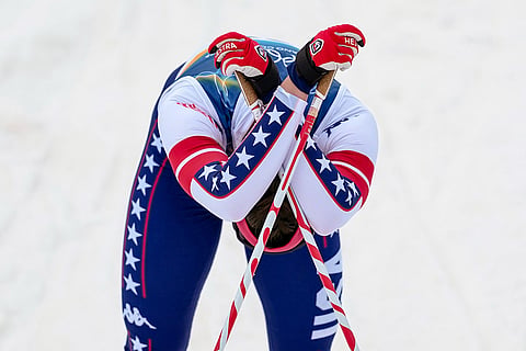 Julia Kern, of the United States reacts after crossing the finish line in a semifinal of the cross-country skiing women's sprint classic at the 2026 Winter Olympics, in Tesero, Italy.