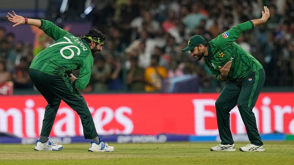AP : Pakistan's Usman Tariq, left, and captain Salman Agha celebrate the wicket of United States' Mohammad Mohsin during their T20 World Cup match in Colombo.