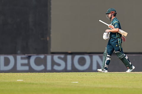Australia's captain Travis Head leaves the ground after losing his wicket during the T20 World Cup cricket match between Australia and Ireland in Colombo, Sri Lanka.
