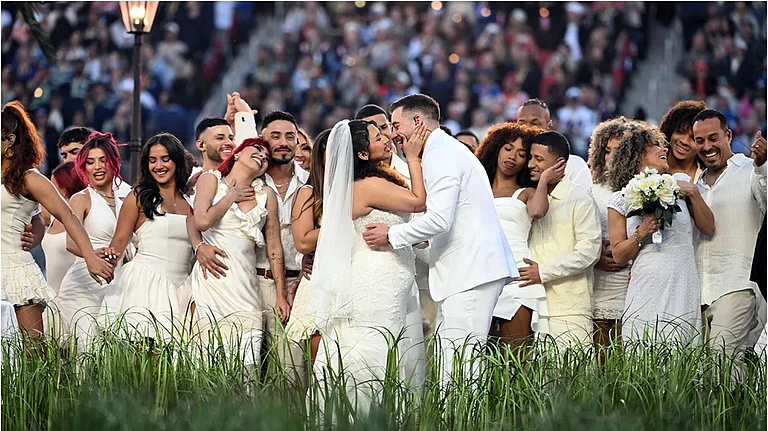 Performers portray a wedding during Puerto Rican singer Bad Bunny performance at Super Bowl - AFP