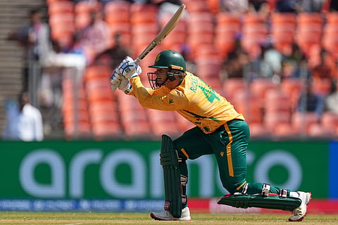 Ryan Rickelton plays a shot during the T20 World Cup cricket match between Afghanistan and South Africa in Ahmedabad.