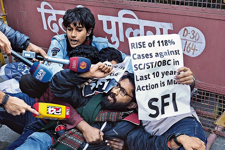 Fair Demand: Delhi police detain an activist from the Students’ Federation of India during a protest in Delhi on February 5 demanding the immediate implementation of the UGC (Promotion of Equity in Higher Education Institutions) Regulations, 2026 - Photo: Tribhuvan Tiwari