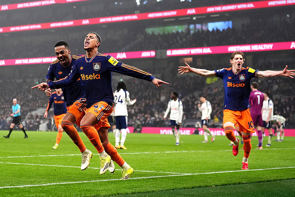 | Photo: John Walton/PA via AP : Newcastle United's Jacob Ramsey, second from left, celebrates scoring their side's second goal against Tottenham during a Premier League soccer match London. 