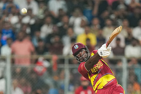 West Indies' Rovman Powell plays a shot during an ICC Men's T20 World Cup 2026 cricket match between England and West Indies, at the Wankhede Stadium, in Mumbai, Maharashtra.