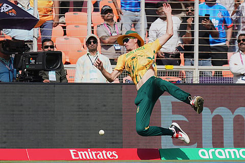 South Africa's Marco Jansen drops a catch off Afghanistan's Azmatullah Omarzai during the T20 World Cup cricket match between Afghanistan and South Africa in Ahmedabad.