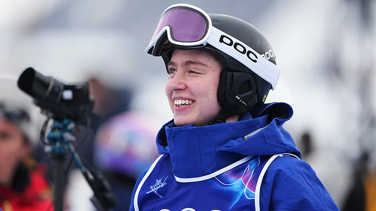 Sweden's Elis Lundholm look on before the women's freestyle skiing moguls qualifications at the 2026 Winter Olympics, in Livigno, Italy, Tuesday, Feb. 10, 2026. - (AP Photo/Lindsey Wasson)