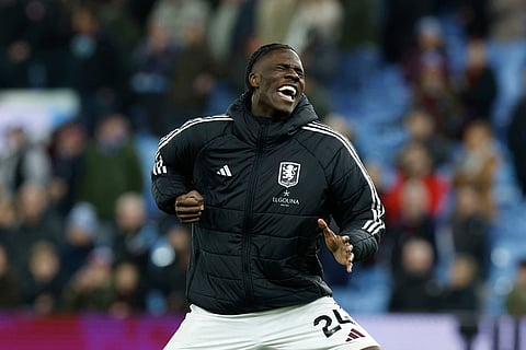 Aston Villa's Amadou Onana reacts at the final whistle after the English Premier League soccer match against Brighton in Birmingham, England.
