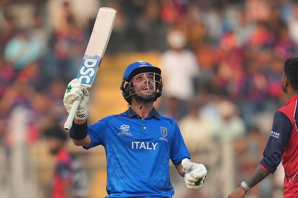 Italys Justin Mosca celebrates his fifty runs 