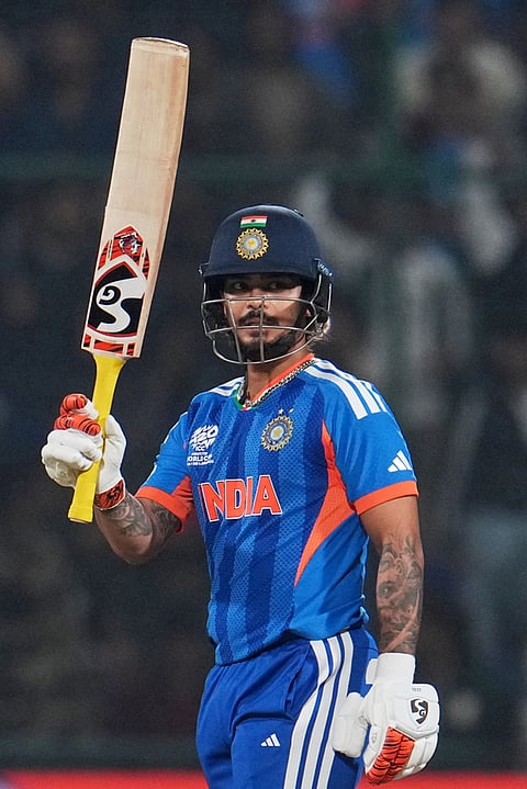 India's Ishan Kishan celebrates his fifty runs during the T20 World Cup cricket match between India and Namibia in New Delhi.