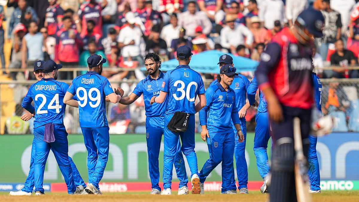  (PTI Photo/Shashank Parade) : Italy's players celebrate the wicket of Nepal's Sandeep Lamichhane during the ICC Men's T20 World Cup 2026 cricket match between Italy and Nepal, at the Wankhede Stadium, in Mumbai, Maharashtra, Thursday, Feb. 12, 2026.