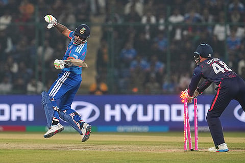 India's captain Suryakumar Yadav, left, watches Namibia's Zane Green stump him out during the T20 World Cup cricket match between India and Namibia in New Delhi.