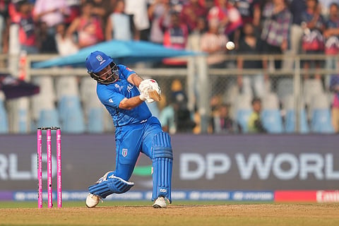 Italy's Anthony Mosca hits a six during the T20 World Cup cricket match between Italy and Nepal in Mumbai, India.