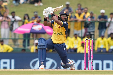 Sri Lanka's Kamindu Mendis plays a shot during the T20 World Cup cricket match between Oman and Sri Lanka in Pallekele, Sri Lanka.