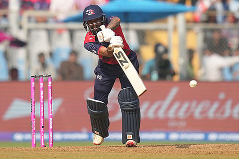 Nepal's Dipendra Singh Airee plays a shot during the T20 World Cup cricket match between Italy and Nepal in Mumbai, India.