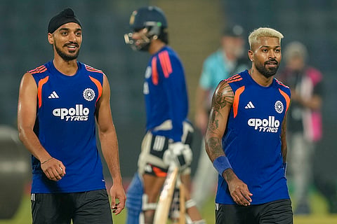 India's Arshdeep Singh, left, and Hardik Pandya during a training session ahead of the ICC Men's T20 World Cup 2026 cricket match between India and Namibia, at Arun Jaitley Stadium, in New Delhi.