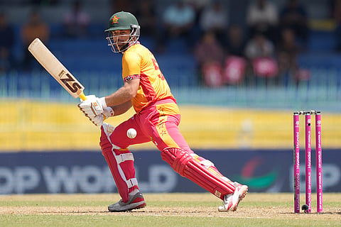 Zimbabwe's Ryan Burl plays a shot during the T20 World Cup cricket match between Australia and Zimbabwe in Colombo, Sri Lanka.