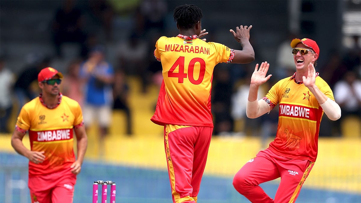 ZimCricketv/X : Zimbabwe cricketers celebrating wickets against Australia in ICC T20 World Cup 2026 Group B clash. 