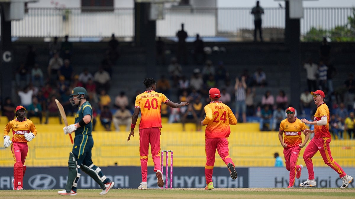 AP Photo : Zimbabwe's Blessing Muzarabani, center, celebrates with teammates the wicket of Australia's Josh Inglis during the ICC T20 World Cup cricket 2026 Group B match between Australia and Zimbabwe in Colombo.