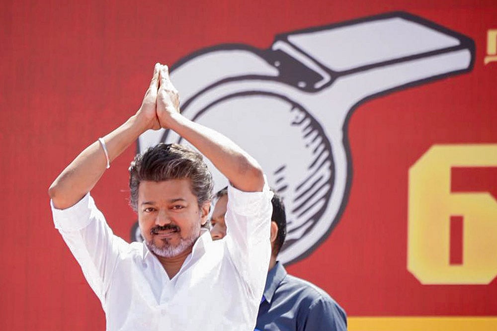 Photo: PTI : Tamilaga Vettri Kazhagam (TVK) chief Vijay during a party meeting, in Salem, Tamil Nadu.