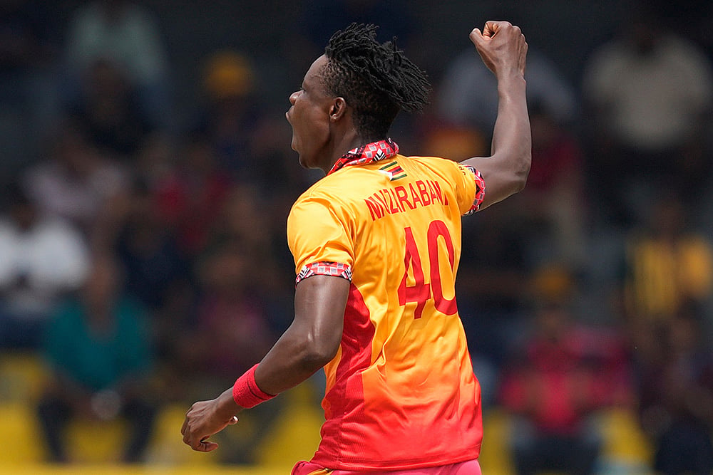 | Photo: AP/Eranga Jayawardena : Zimbabwe's Blessing Muzarabani celebrates the wicket of Australia's Tim David during the T20 World Cup cricket match between Australia and Zimbabwe in Colombo, Sri Lanka.