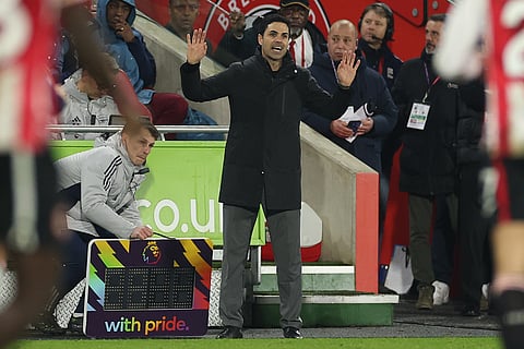 Arsenal's manager Mikel Arteta reacts during the English Premier League soccer match between Brentford and Arsenal in London.