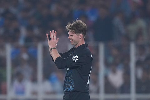 New Zealand's Lockie Ferguson celebrates the wicket of South Africa's Quinton de Kock during the T20 World Cup cricket match between South Africa and New Zealand in Ahmedabad.