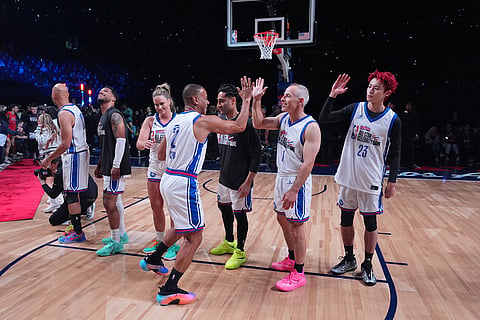 Team Giannis players are introduced at an NBA basketball's All-Star Celebrity Game in Inglewood, Calif.