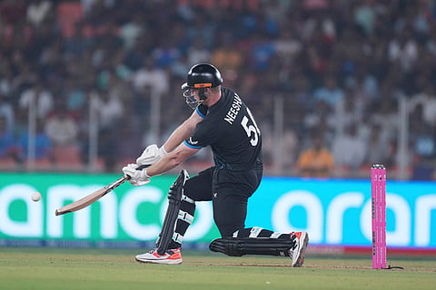 New Zealand's James Neesham plays a shot during the T20 World Cup cricket match between South Africa and New Zealand in Ahmedabad.