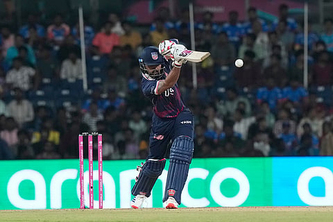 United States' captain Monank Patel plays a shot during the T20 World Cup cricket match between Netherlands and United States in Chennai, India.