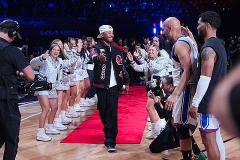 Los Angeles Dodgers' Mookie Betts is introduced before an NBA basketball's All-Star Celebrity Game in Inglewood, Calif.