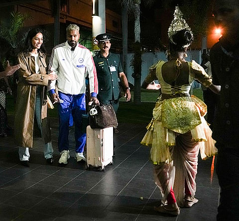 India's Hardik Pandya with his girlfriend and model Mahieka Sharma arrives at the airport, ahead of the ICC Men's T20 World Cup 2026 cricket match against Pakistan, in Colombo, Sri Lanka.