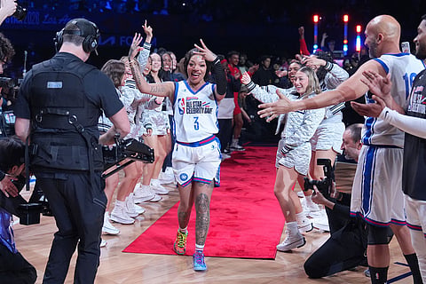 Rapper GloRilla is introduced before an NBA basketball's All-Star Celebrity Game in Inglewood, Calif.