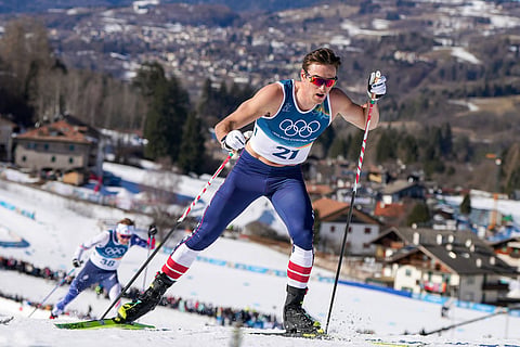 John Steel Hagenbuch, of the United States, competes in the cross country skiing men's 10km interval start free at the 2026 Winter Olympics, in Tesero, Italy.