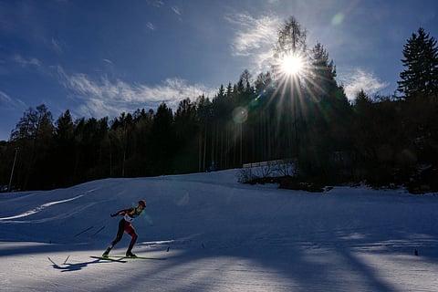 Remi Drolet, of Canada, competes in the cross country skiing men's 10km interval start free at the 2026 Winter Olympics, in Tesero, Italy.
