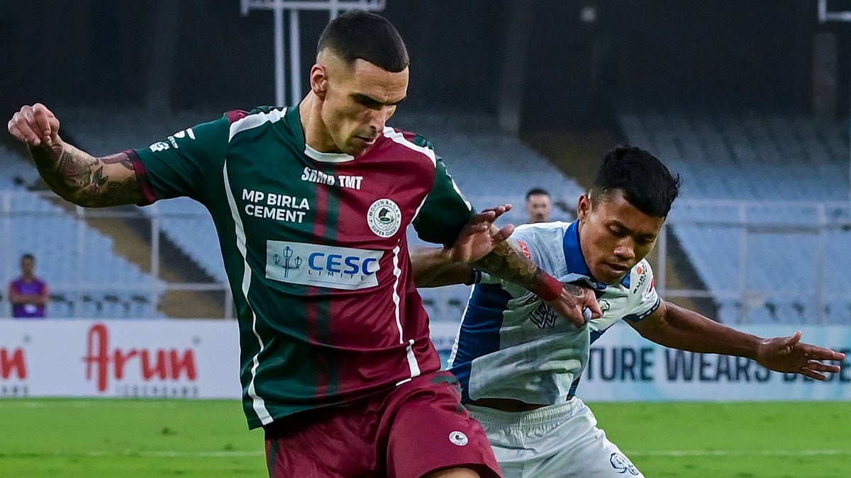 | Photo: PTI : Kolkata: Kerala Blasters' Thingujam Korou Singh, right, vies for the ball with Mohun Bagan Super Giant's Alberto Rodriguez Martin during the Indian Super League (ISL) 2025-26 football match between Mohun Bagan Super Giant and Kerala Blasters at Vivekananda Yuba Bharati Krirangan stadium, in Kolkata, Saturday, Feb. 14, 2026.