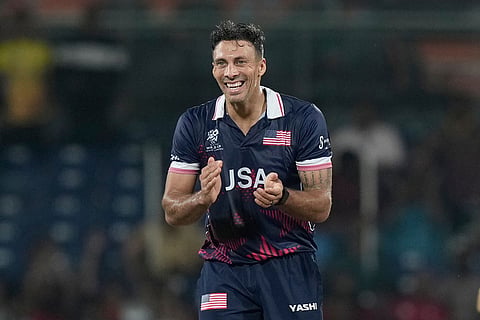 United States' Shadley Van Schalkwyk celebrates the wicket of Netherlands' Fred Klaassen during the T20 World Cup cricket match between Netherlands and United States in Chennai, India.