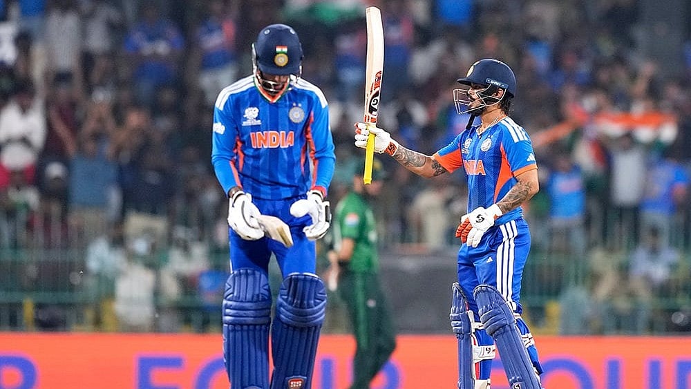 | Photo: AP/Eranga Jayawardena : India's Ishan Kishan, right, celebrates his fifty runs as batting partner Tilak Varma looks on during the T20 World Cup cricket match between India and Pakistan in Colombo, Sri Lanka.