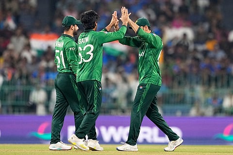 Pakistan's Saim Ayub, center, celebrates with teammates the wicket of India's Tilak Varma during the T20 World Cup cricket match between India and Pakistan in Colombo, Sri Lanka.
