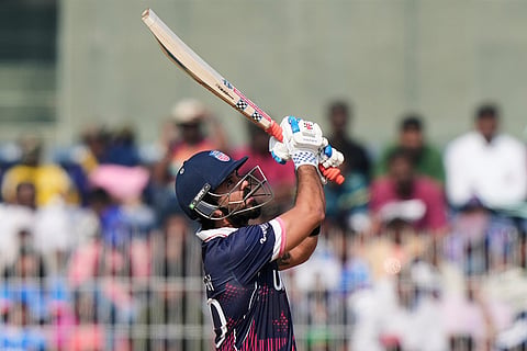 United States' Shayan Jahangir hits a six during the T20 World Cup cricket match between Namibia and USA in Chennai.
