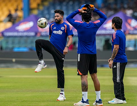 India's Mohammed Siraj, left, with teammates during a practice session ahead of an ICC Men's T20 World Cup 2026 cricket match between India and Pakistan, at R Premadasa Stadium, in Colombo, Sri Lanka.