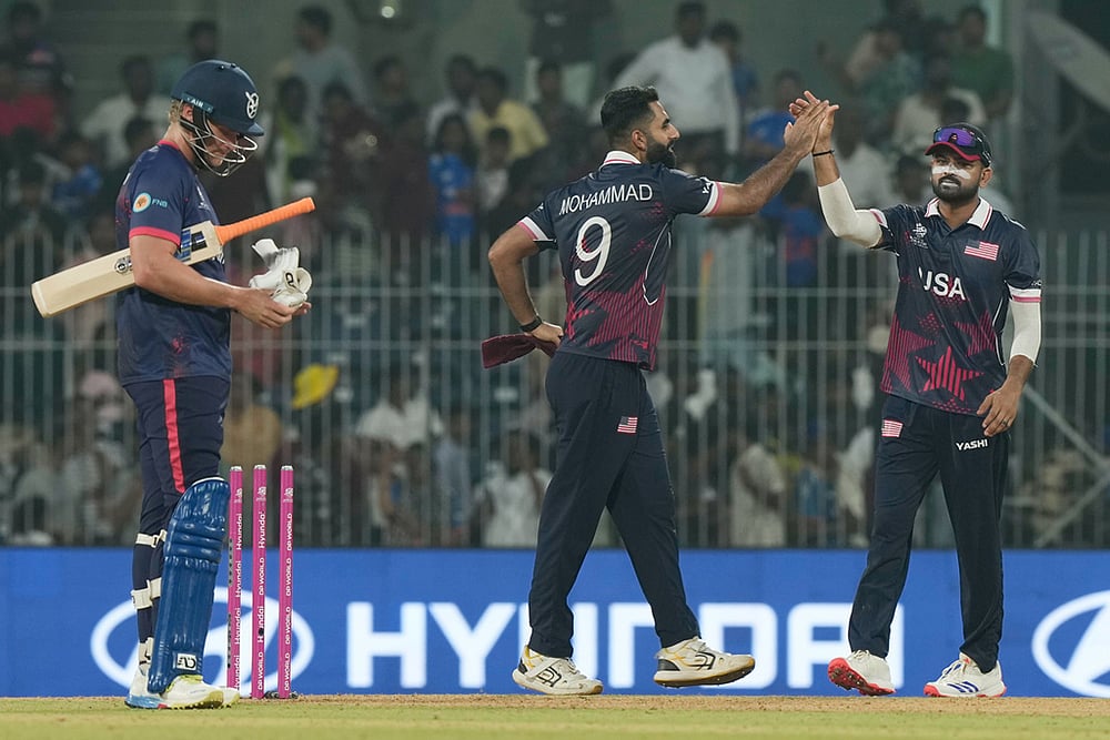 | Photo: AP/Mahesh Kumar A. : United States' captain Monank Patel, right, and Mohammad Mohsin, center, celebrates after won the T20 World Cup cricket match against Namibia in Chennai.