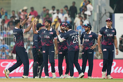 United States' Saurabh Netravalkar, second left, celebrates with teammates the wicket of Namibia's Nicol Loftie-Eaton during the T20 World Cup cricket match between Namibia and USA in Chennai.