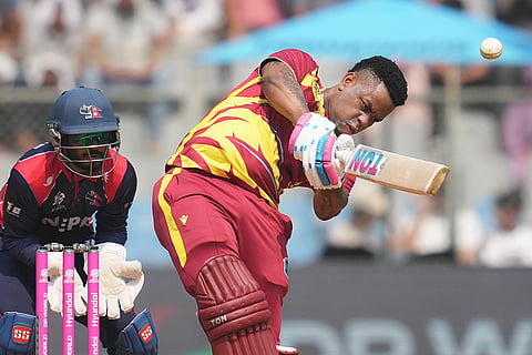 West Indies' Shimron Hetmyer hits a six during the T20 World Cup cricket match between Nepal and West Indies in Mumbai.