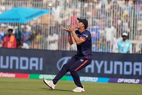 Namibia's JJ Smit takes the catch to get dismiss United States' captain Monank Patel during the T20 World Cup cricket match between Namibia and USA in Chennai.