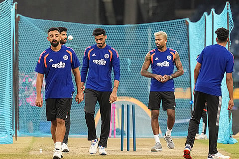 India's Varun Chakaravarthy, Axar Patel, Hardik Pandya and others during a practice session ahead of an ICC Men's T20 World Cup 2026 cricket match between India and Pakistan, at R Premadasa Stadium, in Colombo, Sri Lanka.